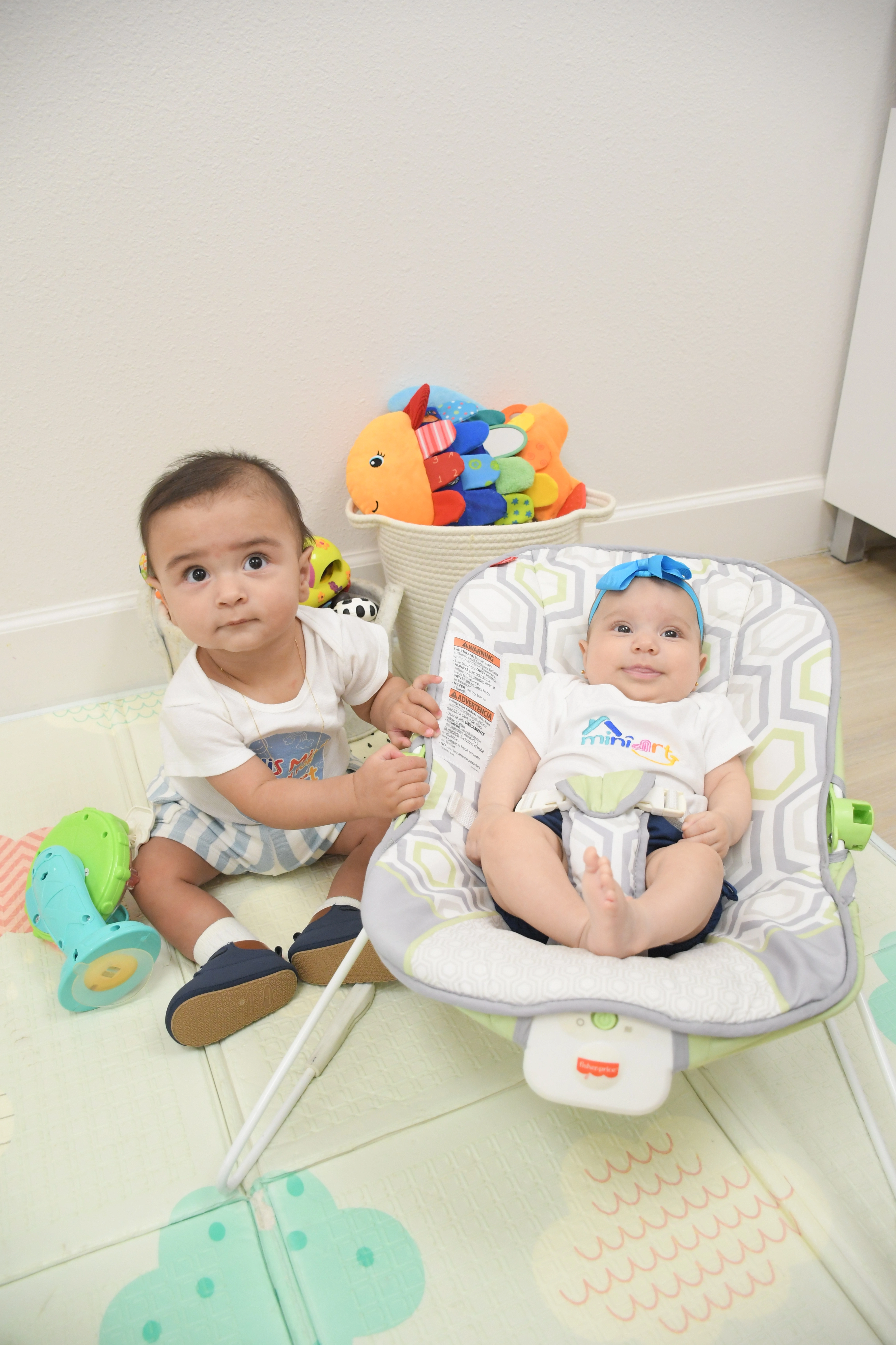 Two cute babies playing during Infant Care at MiniArt